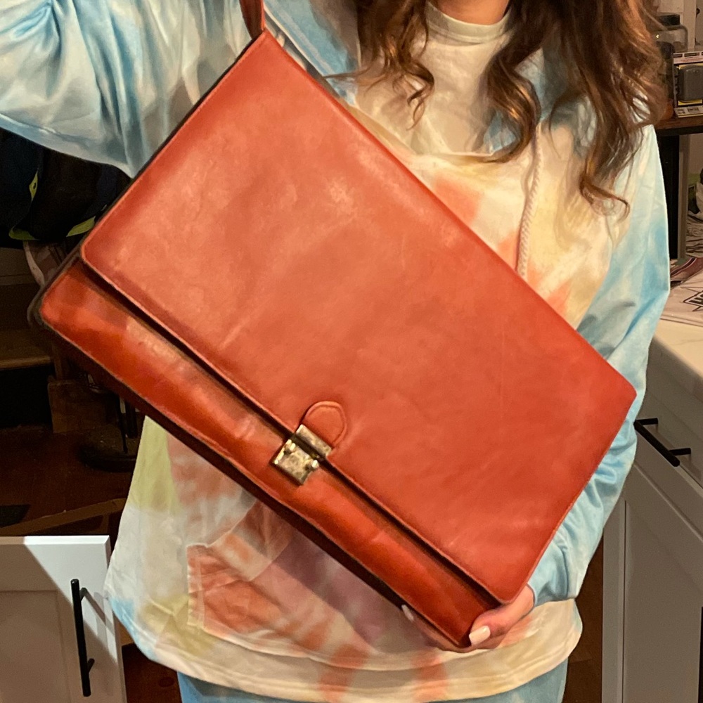 Vintage oversized leather wristlet laptop bag